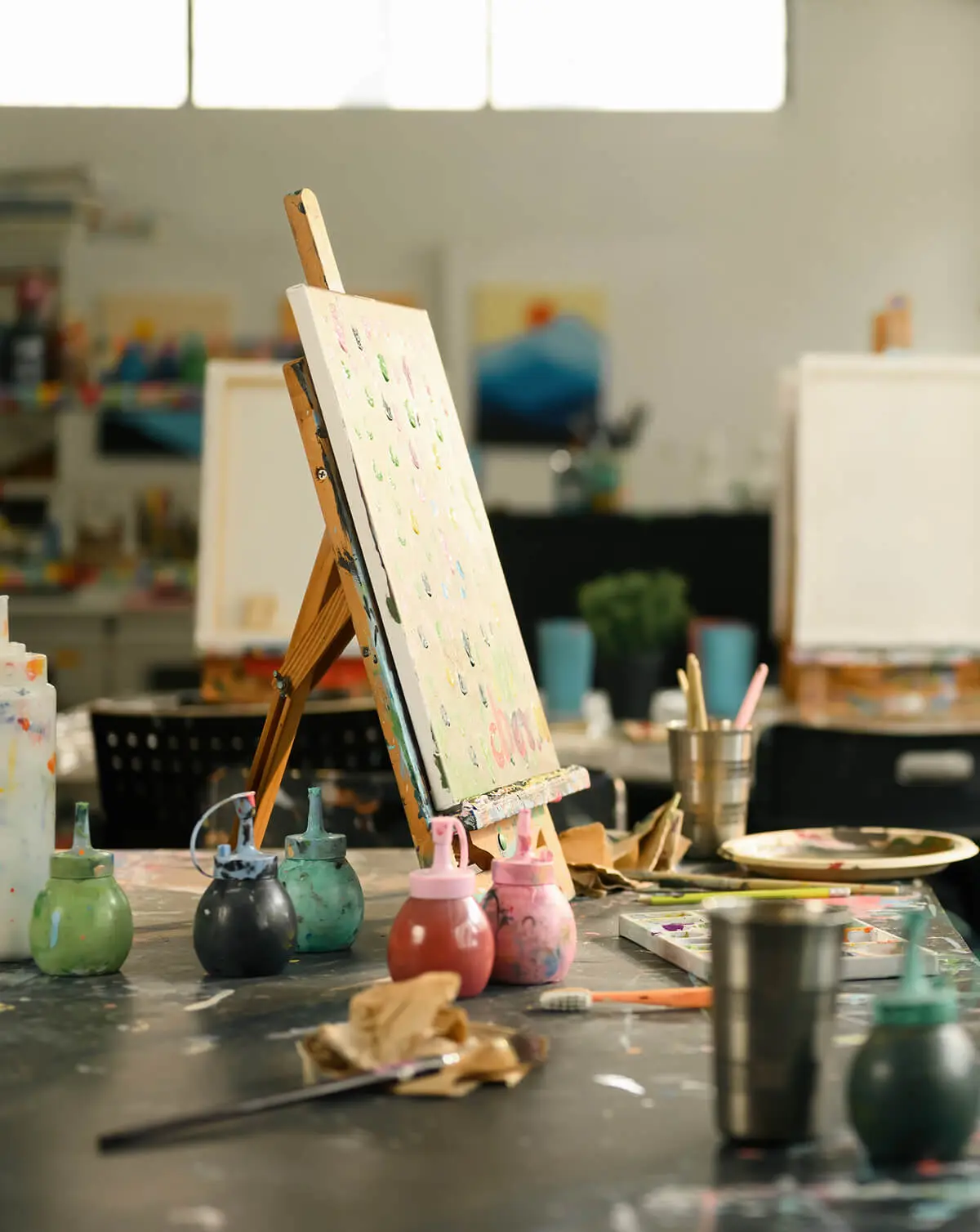 Creative workspace with canvas and supplies